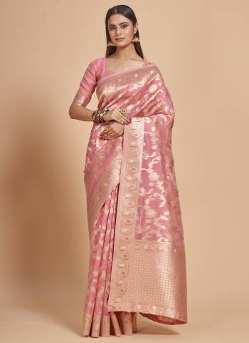 Garb This Partywear Saree Paired With Blouse In Fine Color.This Saree And Blouse Are Organza Based Fabric With Weaving Jacquard Designer. Buy This Pretty Saree Now.