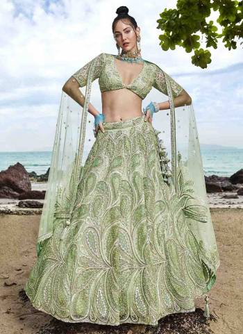 Attrective Looking This Partywear Fine Color Heavy Designer Choli Fabric Net And Lahenga Net And Dupatta Net In Fabricated Beautified With Attrective Thread,Sequance Embroidery Work. Buy Now.