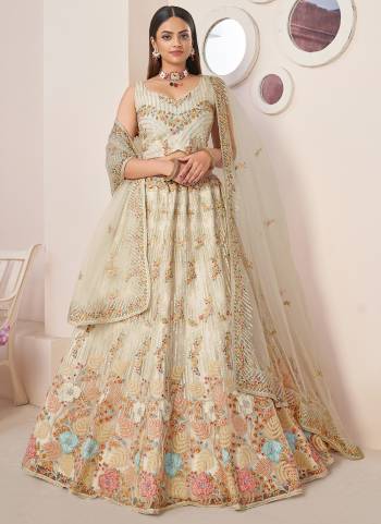 For A Fancy Designer Look,Grab These Lehenga Choli With Dupatta in Fine Colored.These Lehenga And Choli Are Net And Dupatta Are Fabricated On Net Pair.Its Beautified With Designer Sequance Embroidery,Diamond Work.