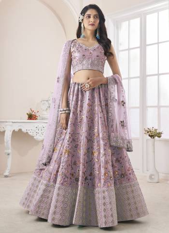 For A Fancy Designer Look,Grab These Lehenga Choli With Dupatta in Fine Colored.These Lehenga And Choli Are Art Silk And Dupatta Are Fabricated On Soft Net Pair.Its Beautified With Designer Thread,Dori Embroidery,Zarkan Work.