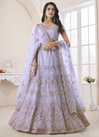 For A Fancy Designer Look,Grab These Lehenga Choli With Dupatta in Fine Colored.These Lehenga And Choli Are Soft Net And Dupatta Are Fabricated On Soft Net Pair.Its Beautified With Designer Thread,Dori,Sequance Embroidery,Zarkan Work.