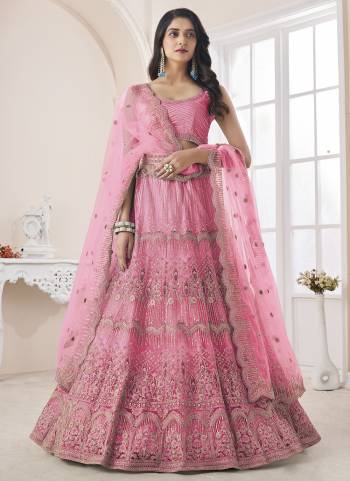 For A Fancy Designer Look,Grab These Lehenga Choli With Dupatta in Fine Colored.These Lehenga And Choli Are Soft Net And Dupatta Are Fabricated On Soft Net Pair.Its Beautified With Designer Thread,Dori,Sequance Embroidery,Zarkan Work.