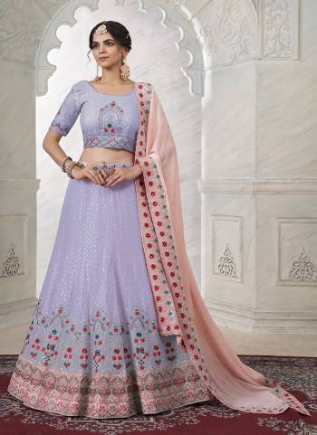 For A Fancy Designer Look,Grab These Lehenga Choli With Dupatta in Fine Colored.These Lehenga And Choli Are Soft Net And Dupatta Are Fabricated On Soft Net Pair.Its Beautified With Designer Thread,Dori Embroidery,Stone Work.