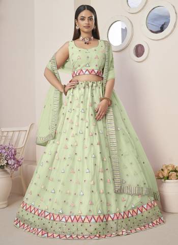 For A Fancy Designer Look,Grab These Lehenga Choli With Dupatta in Fine Colored.These Lehenga And Choli Are Net And Dupatta Are Fabricated On Net Pair.Its Beautified With Designer Thread,Sequance Embroidery Work.