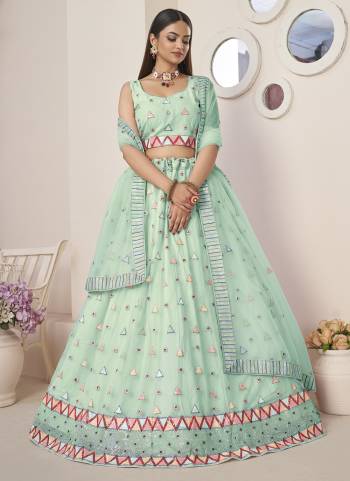 For A Fancy Designer Look,Grab These Lehenga Choli With Dupatta in Fine Colored.These Lehenga And Choli Are Net And Dupatta Are Fabricated On Net Pair.Its Beautified With Designer Thread,Sequance Embroidery Work.