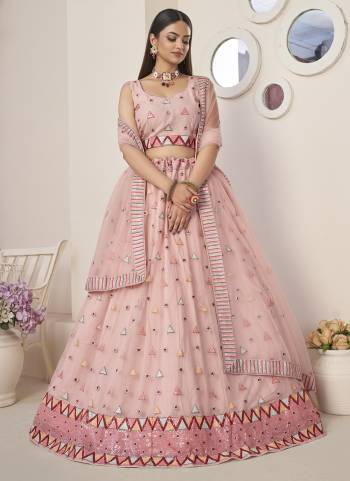 For A Fancy Designer Look,Grab These Lehenga Choli With Dupatta in Fine Colored.These Lehenga And Choli Are Net And Dupatta Are Fabricated On Net Pair.Its Beautified With Designer Thread,Sequance Embroidery Work.