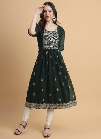 Garb These Beautiful Looking Readymade Long Kurti.These Kurti is Fabricated On Georgette.Its Beautified With Designer Thread Embroidery Work.