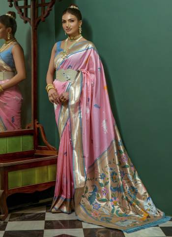 Garb These Festive Wear Saree in Fine Colored.These Saree And Blouse is Fabricated On Soft Paithani Silk.Its Beautified With Handloom Weavon Jari Designer.