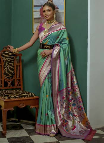 Garb These Festive Wear Saree in Fine Colored.These Saree And Blouse is Fabricated On Soft Paithani Silk.Its Beautified With Handloom Weavon Jari Designer.