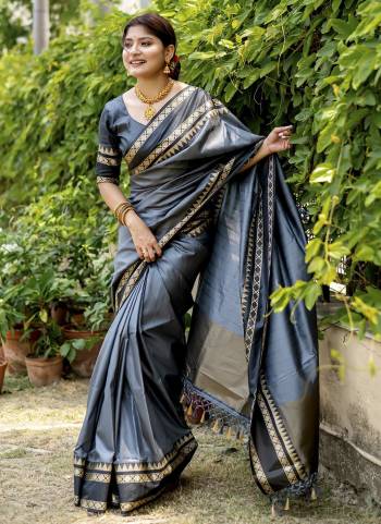 Attrective Looking These Festive Wear Saree in Fine Colored.These Saree And Blouse is Fabricated On Raw Silk.Its Beautified With Temple Wevon Designer.