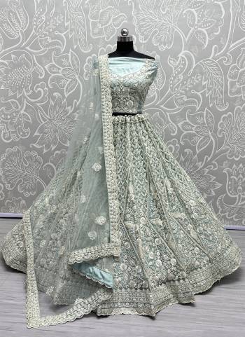 For A Fancy Designer Look,Grab These Lehenga Choli With Dupatta in Fine Colored.These Lehenga And Choli Are Net And Dupatta Are Fabricated On Soft Net Pair.Its Beautified With Designer Thread,Dori Embroidery, Diamond Work.