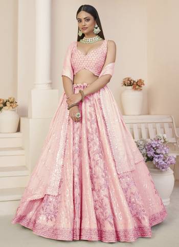 For A Fancy Designer Look,Grab These Lehenga Choli With Dupatta in Fine Colored.These Lehenga And Choli Are Faux Georgette And Dupatta Are Fabricated On Faux Georgette Pair.Its Beautified With Designer Sequance Embroidery,Stone Work.