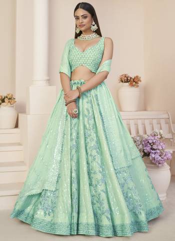 For A Fancy Designer Look,Grab These Lehenga Choli With Dupatta in Fine Colored.These Lehenga And Choli Are Faux Georgette And Dupatta Are Fabricated On Faux Georgette Pair.Its Beautified With Designer Sequance Embroidery,Stone Work.