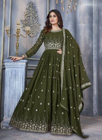 Green colored suit is prettified with sequins embroidery work as shown which makes it appear classy. This top is made of georgette fabric which is accompanied with santoon bottom, Santoon inner and georgette dupatta. Women can buy this suit to wear for their parties, festive, functions and events.