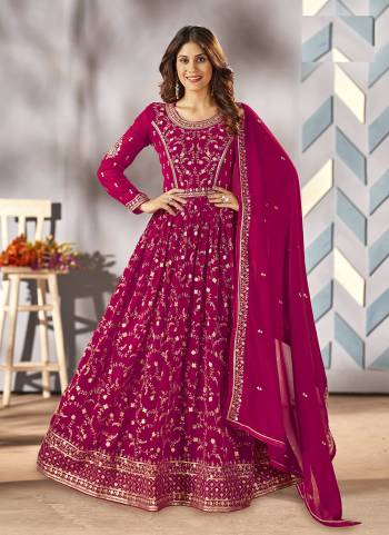 Rani Pink colored suit is prettified with sequins embroidery work as shown which makes it appear classy. This top is made of georgette fabric which is accompanied with santoon bottom, Santoon inner and georgette dupatta. Women can buy this suit to wear for their parties, festive, functions and events.