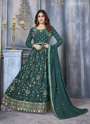 Aqua Green colored suit is prettified with sequins embroidery work as shown which makes it appear classy. This top is made of georgette fabric which is accompanied with santoon bottom, Santoon inner and georgette dupatta. Women can buy this suit to wear for their parties, festive, functions and events.