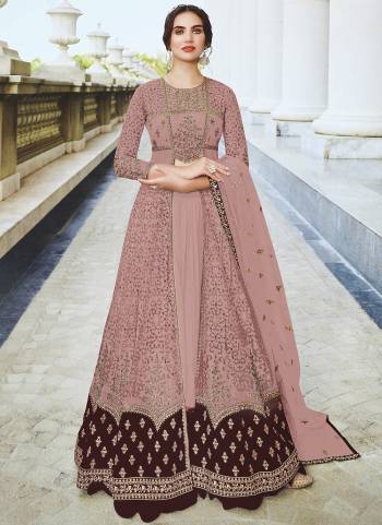 This Peach colored anarkali suit is beautifully Embroidery Work, Diamond Work and sequins work as shown. This net anarkali suit comes along with semi stitched Santoon bottom, Santoon Inner and net dupatta which makes it appear more adorning. Women can buy this suit to wear for their party, sangeet, homely events and ideal for any fashionista.