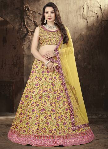 For A Designer Look,Grab These Lehenga Choli in Fine Colored.These Lehenga And Blouse Are Fabricated On Satin Pair With Butterfly Net Dupatta.Its Beautified With Designer Printed,Antique Mirror Work.