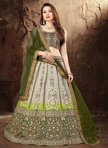 For A Designer Look,Grab These Lehenga Choli in Fine Colored.These Lehenga And Blouse Are Fabricated On Satin Pair With Butterfly Net Dupatta.Its Beautified With Designer Printed,Antique Mirror Work.