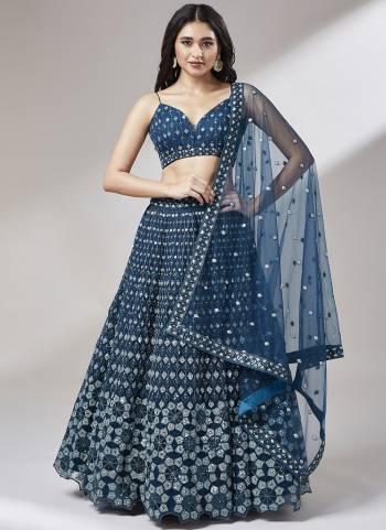 Attrective Looking This Partywear Fine Color Heavy Designer Choli Fabric Net And Lahenga Net And Dupatta Net In Fabricated Beautified With Attrective Thread,Sequance Embroidery Work. Buy Now.