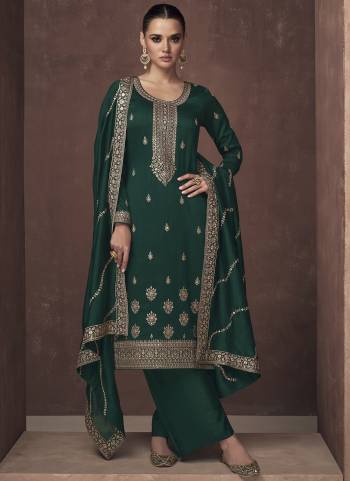 Garb These Designer Suits in Fine Colored Pair With Dupatta.These Top Are Silk And Dupatta Are Fabricated On Silk Pair With Silk Bottom.Its Beautified With Heavy Designer Embroidery Work.