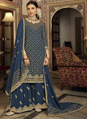 Attrective Looking These Sharara Suit in Fine Colored Pair With Bottom And Dupatta.These Top And Dupatta Are Fabricated On Chinon Pair With Chinon Bottom And  Santoon Inner.Its Beautified With Heavy Designer Embroidery Work.