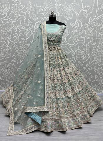 For A Fancy Designer Look,Grab These Lehenga Choli With Dupatta in Fine Colored.These Lehenga And Choli Are Net And Dupatta Are Fabricated On Soft Net Pair.Its Beautified With Designer Thread,Dori Embroidery, Diamond Work.