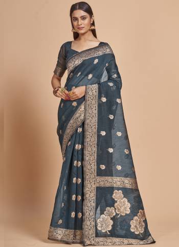 Garb This Partywear Saree Paired With Blouse In Fine Color.This Saree And Blouse Are Cotton Spun Based Fabric With Weaving Jacquard Designer With Sequance Work. Buy This Pretty Saree Now.