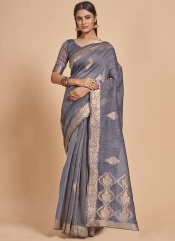 Garb This Partywear Saree Paired With Blouse In Fine Color.This Saree And Blouse Are Cotton Spun Based Fabric With Weaving Jacquard Designer With Sequance Work. Buy This Pretty Saree Now.