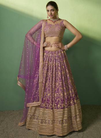 For A Designer Look,Grab These Lehenga Choli in Fine Colored.These Lehenga And Choli Are Fabricated On Georgette Pair With Net Dupatta.Its Beautified With Designer Sequance Embroidery Work.