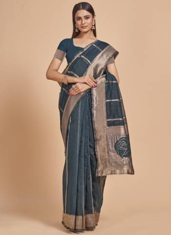 Garb This Partywear Saree Paired With Blouse In Fine Color.This Saree And Blouse Are Cotton Spun Based Fabric With Weaving Jacquard Designer With Sequance Work. Buy This Pretty Saree Now.