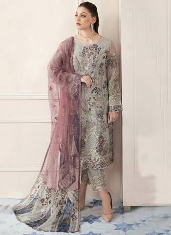 Attrective These Designer Suit in Fine Colored Pair With Bottom And Dupatta.These Top Are Faux Georgette And Dupatta Are Fabricated On Net Pair With Santoon Bottom.Its Beautified With Santoon Inner.Its Beautified With Heavy Designer Floral Thread Embroidery Work.