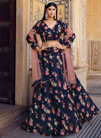 Attrective These Party Wear Lahenga Choli in Fine Colored.These Blouse And Lahenga Are Fabricated On Silk Pair With Net Dupatta.Its Beautified With Crushed With Designer Floral Printed.