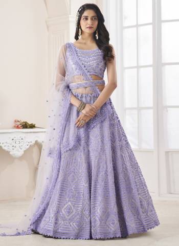 For A Designer Look,Grab These Lehenga Choli in Fine Colored.These Lehenga And Choli Are Fabricated On Soft Net Pair With Soft Net Dupatta.Its Beautified With Heavy Designer Embroidery Work.