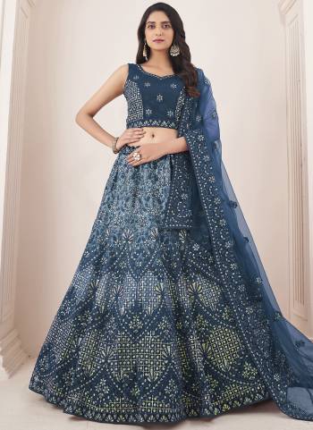 For A Designer Look,Grab These Lehenga Choli in Fine Colored.These Lehenga And Choli Are Fabricated On Soft Net Pair With Soft Net Dupatta.Its Beautified With Heavy Designer Embroidery Work.