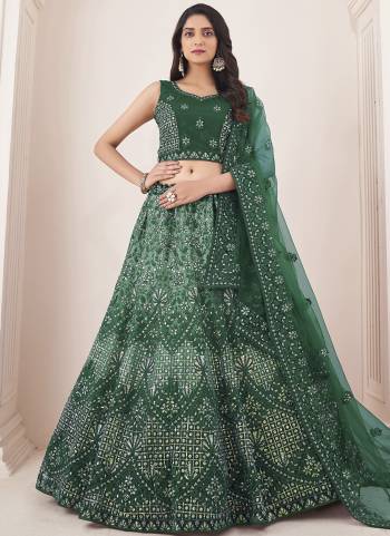 For A Designer Look,Grab These Lehenga Choli in Fine Colored.These Lehenga And Choli Are Fabricated On Soft Net Pair With Soft Net Dupatta.Its Beautified With Heavy Designer Embroidery Work.