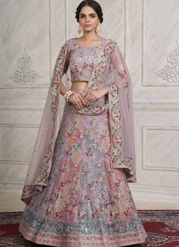 For A Designer Look,Grab These Lehenga Choli in Fine Colored.These Lehenga And Choli Are Fabricated On Soft Net Pair With Soft Net Dupatta.Its Beautified With Heavy Designer Embroidery Work.