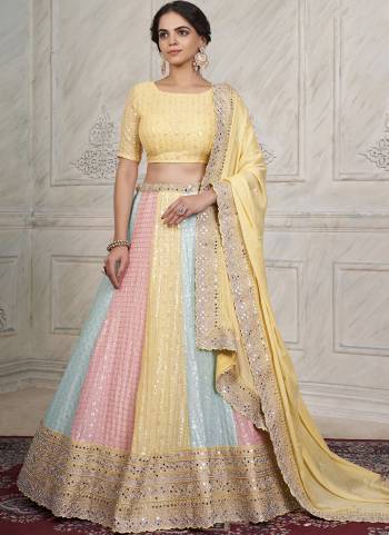 For A Designer Look,Grab These Lehenga Choli in Fine Colored.These Lehenga And Choli Are Fabricated On Georgette Pair With Georgette Dupatta.Its Beautified With Heavy Designer Embroidery Work.