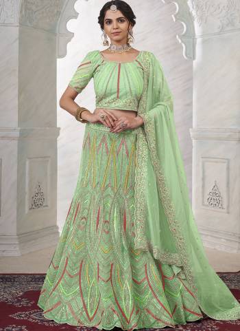 For A Designer Look,Grab These Lehenga Choli in Fine Colored.These Lehenga And Choli Are Fabricated On Soft Net Pair With Soft Net Dupatta.Its Beautified With Heavy Designer Embroidery Work.