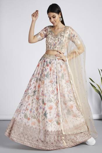 Attrective Looking This Partywear Fine Color Heavy Designer Choli And Lahenga Organza And Dupatta Net In Fabricated Beautified With Attrective Printed With Thread,Sequance Embroidery Work. Buy Now.