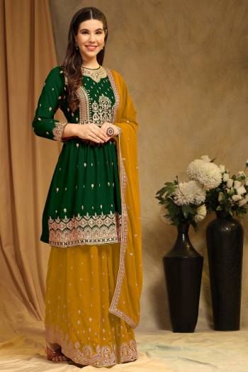 Attrective These Sharara Suit in Fine Colored Pair With Bottom And Dupatta.These Top Are Faux Georgette And Bottom Are Fabricated On Faux Georgette Pair With Faux Georgette Dupatta.Its Beautified With Santoon Inner.Its Beautified With Designer Embroidery Work.