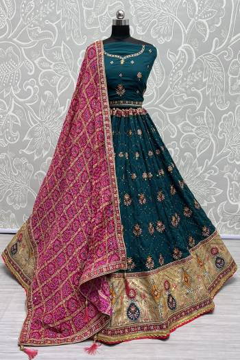 For A Fancy Designer Look,Grab These Lehenga Choli With Dupatta in Fine Colored.These Lehenga And Choli Are Gadhawal Silk And Dupatta Are Fabricated On Chiffon Pair.Its Beautified With Designer Printed,Jari Sequance Embroidery,Zarkan Diamond Work.