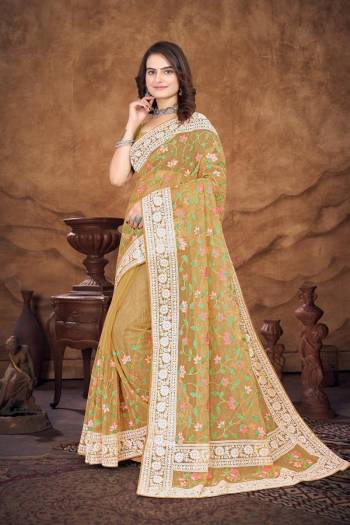 Garb This Party Wear Saree Are Fine Saree Paired With Blouse.This Saree And Blouse Are Organza Fabric With Designer Heavy Multy Thread Embroidery Work. Buy This Pretty Saree Now.