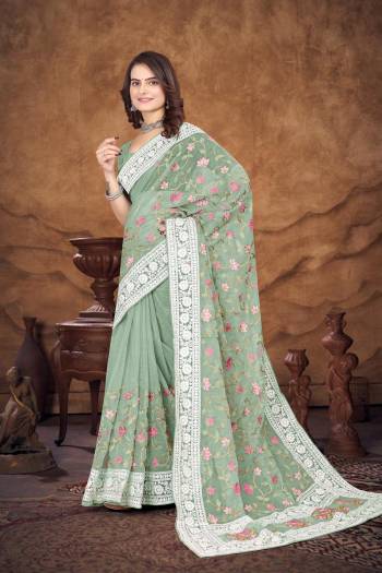 Garb This Party Wear Saree Are Fine Saree Paired With Blouse.This Saree And Blouse Are Organza Fabric With Designer Heavy Multy Thread Embroidery Work. Buy This Pretty Saree Now.