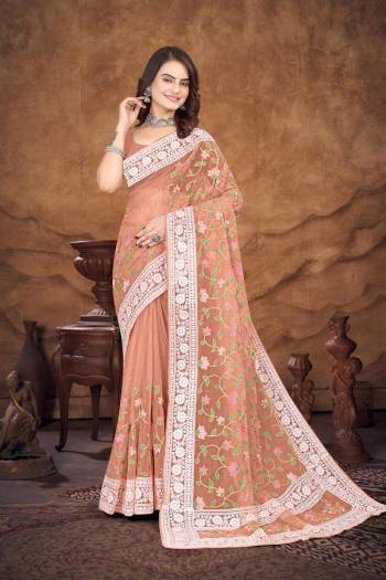 Garb This Party Wear Saree Are Fine Saree Paired With Blouse.This Saree And Blouse Are Organza Fabric With Designer Heavy Multy Thread Embroidery Work. Buy This Pretty Saree Now.