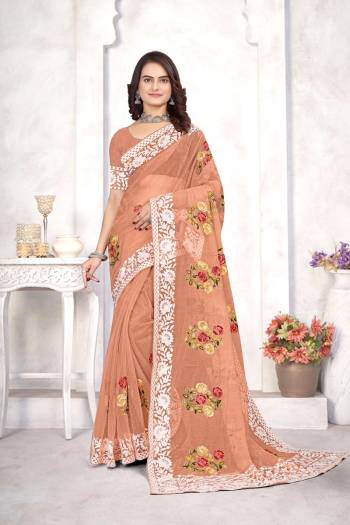 Garb This Party Wear Saree Are Fine Saree Paired With Blouse.This Saree And Blouse Are Organza Fabric With Designer Heavy Multy Thread Embroidery Work. Buy This Pretty Saree Now.