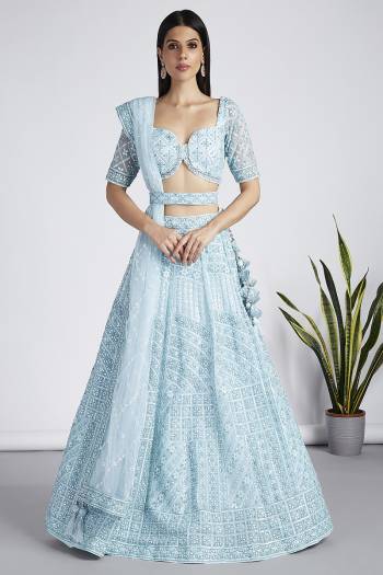 Attrective Looking This Partywear Fine Color Heavy Designer Choli Fabric Net And Lahenga Net And Dupatta Net In Fabricated Beautified With Attrective Thread,Sequance Embroidery Work. Buy Now.