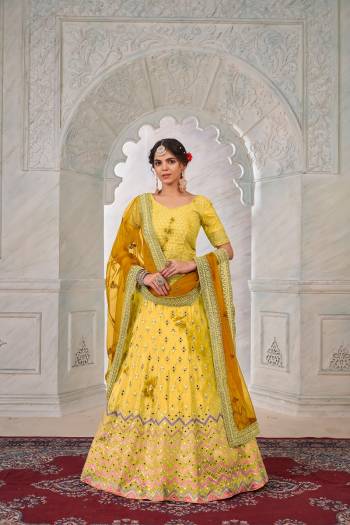 For A Fancy Designer Look,Grab These Lehenga Choli With Dupatta in Fine Colored.These Lehenga And Choli Are Shibori Crepe And Dupatta Are Fabricated On Net Pair.Its Beautified With Designer Mirror,Jari Embroidery,Stone Work.