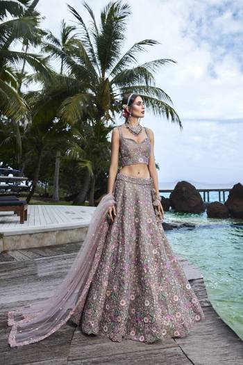 Attrective Looking This Partywear Fine Color Heavy Designer Choli Fabric Net And Lahenga Net And Dupatta Net In Fabricated Beautified With Attrective Thread,Sequance Embroidery Work. Buy Now.