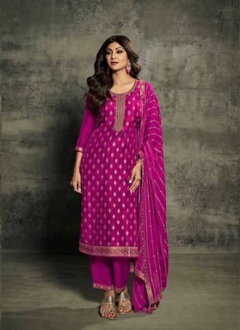 Garb These Designer Suit in Fine Colored Pair With Bottom And Dupatta.These Top Are Jacquard Silk And Dupatta Are Fabricated On Chinon Silk Pair With Santoon Bottom.Its Beautified With Dull Santoon Inner.Its Beautified With Wevon Jacquard Designer, Embroidery Work.